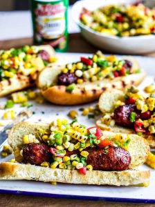 Grilled Sausage Dogs with Cajun Corn Salsa