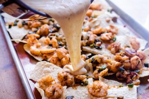Creole Shrimp Nachos with Creamy Queso