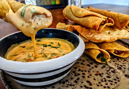 Dirty Rice Taquitos with Creole Cheese Dip