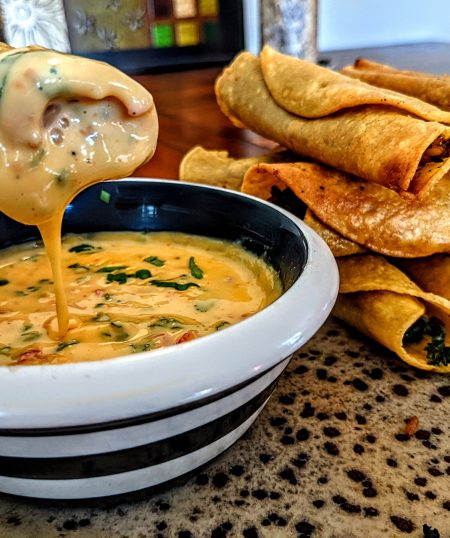 Dirty Rice Taquitos with Creole Cheese Dip